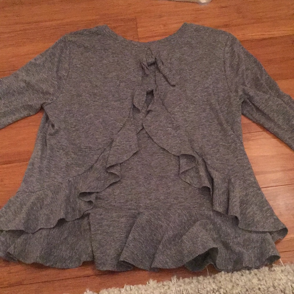 Francesca's top with bows and ruffles in back
